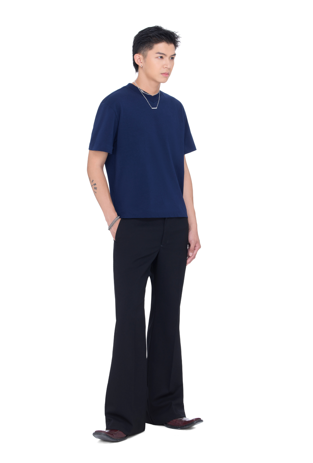 The Beuter Black Technical Flared Trousers