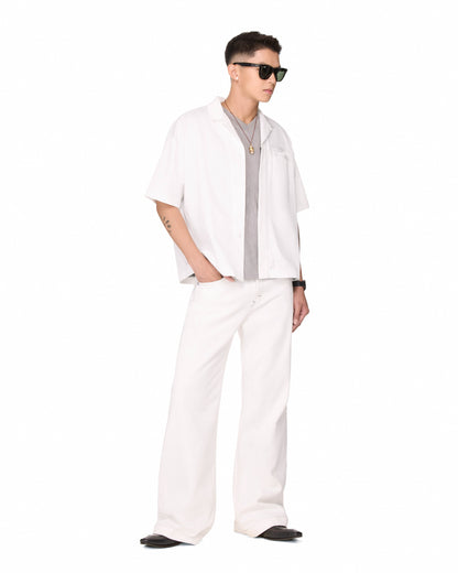 The Beuter Flare Raw Denim Jeans - Off-White