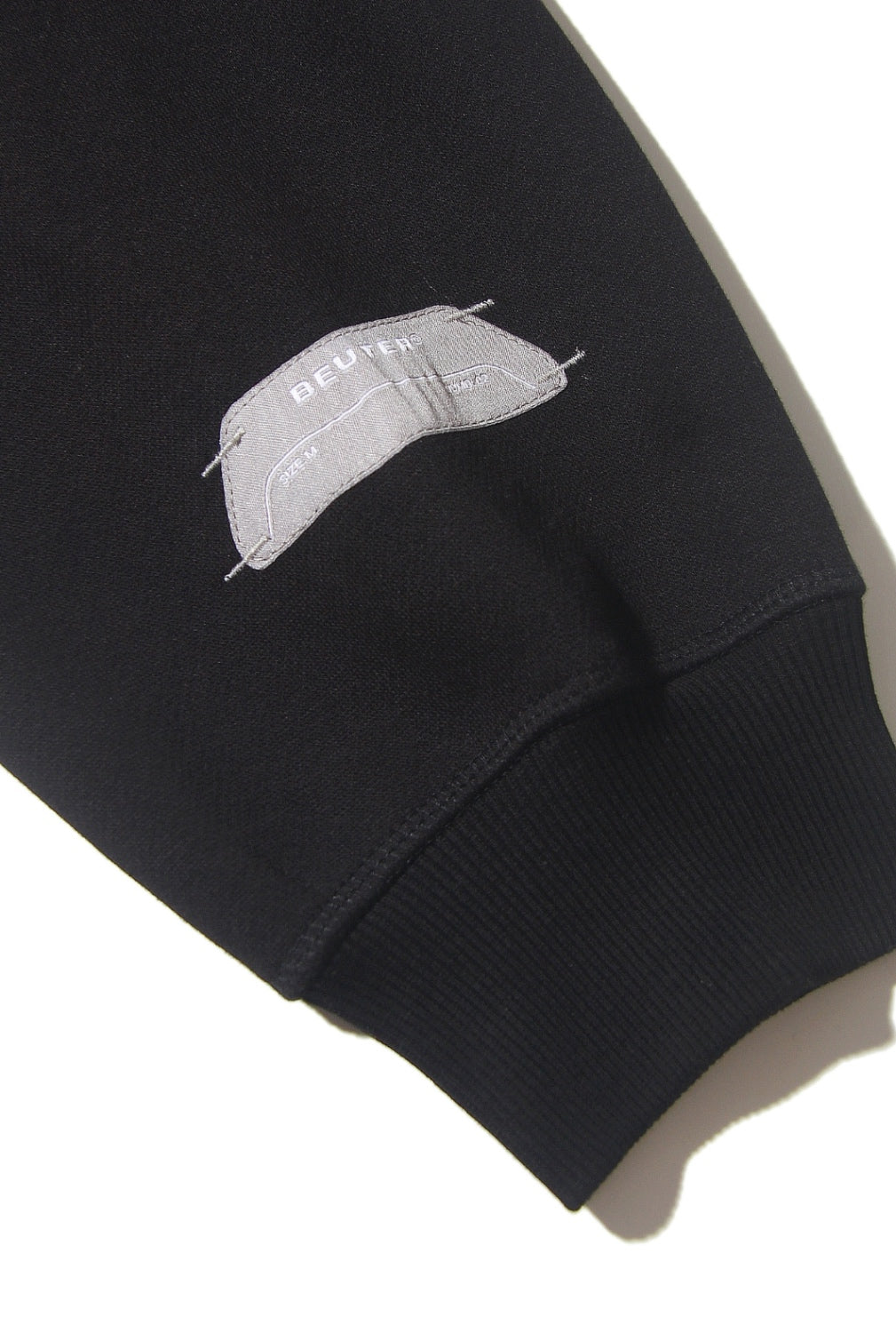 The Beuter Matte Black Boxy Zip