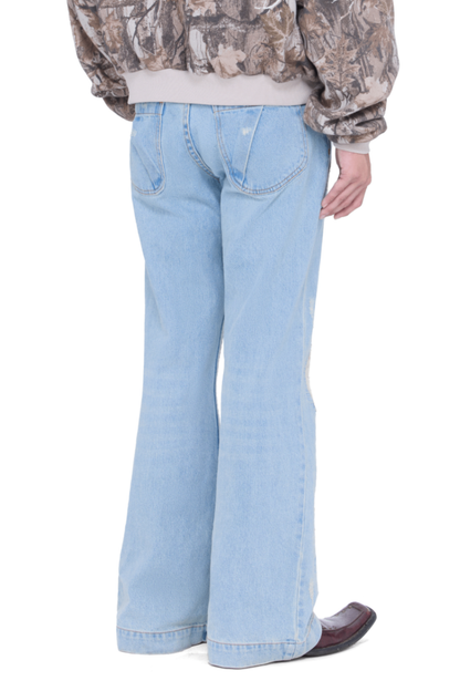 The Beuter Ss25 Flare Distressed Blue Jeans