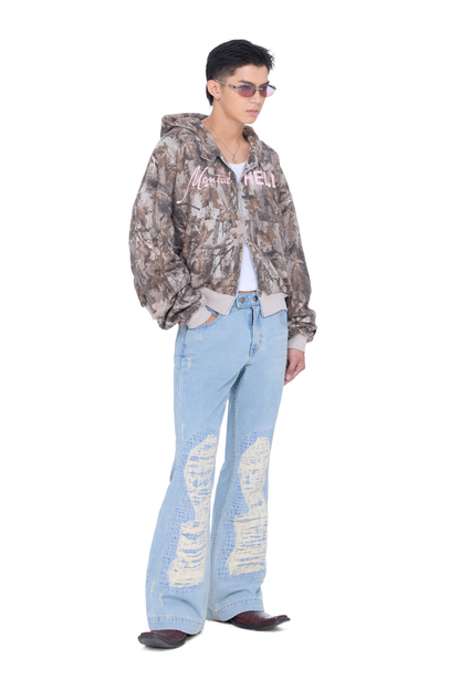 The Beuter Ss25 Flare Distressed Blue Jeans
