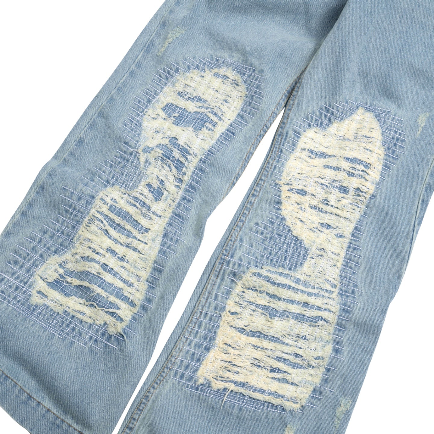 The Beuter Ss25 Flare Distressed Blue Jeans