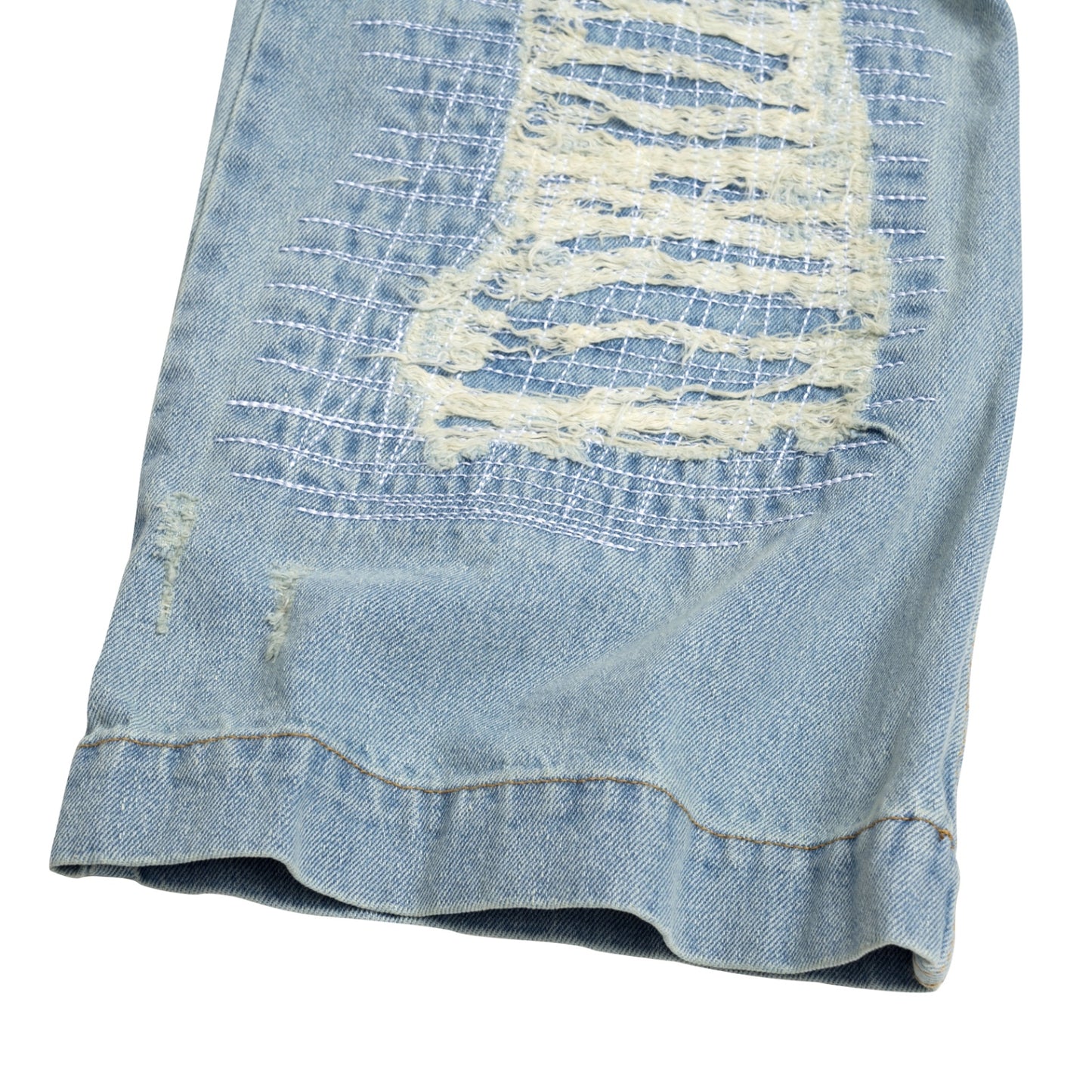 The Beuter Ss25 Flare Distressed Blue Jeans